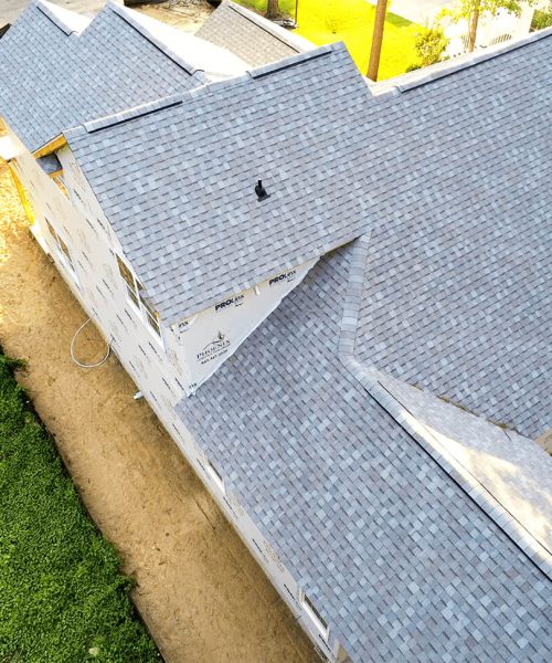 Grey roof shingles top